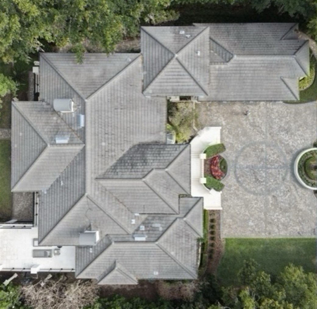 Tile roof before drone cleaning