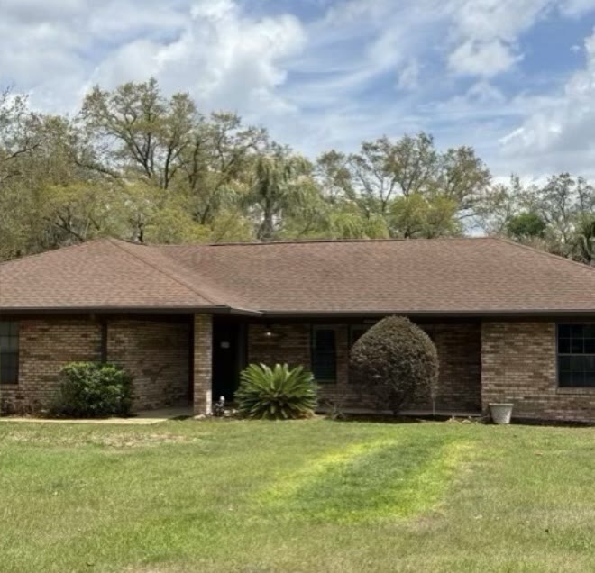 Residential shingle roof · Central FL — after cleaning