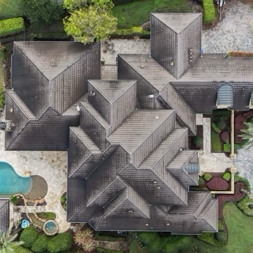 Estate shingle roof · Orlando — before cleaning